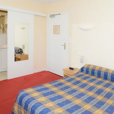 Logis Hotel Du Commerce Pont-d'Ouilly Buitenkant foto